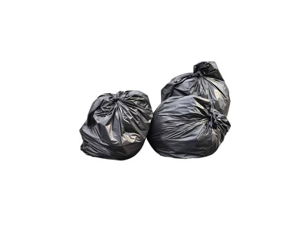 istock Black plastic garbage bag isolated on white background. Waste management. Housekeeping concept 2193893093