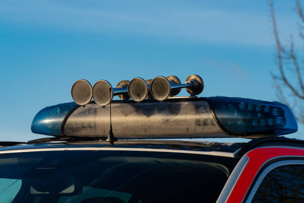 istock Police vehicle light bar with multiple siren horns on top 2193894052