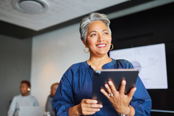 istock Confident Leader with Tablet in Meeting 2193895606