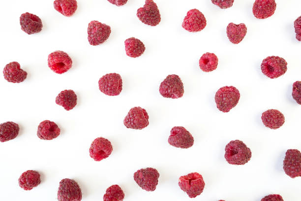 istock Delicious ripe raspberries on white background, top view 2193895981