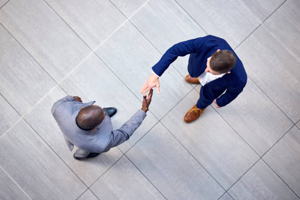 istock High-Angle Handshake: Sealing the Deal 2193896173