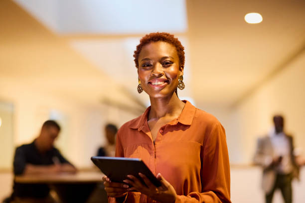 istock Confident Businesswoman with Tablet 2193896266