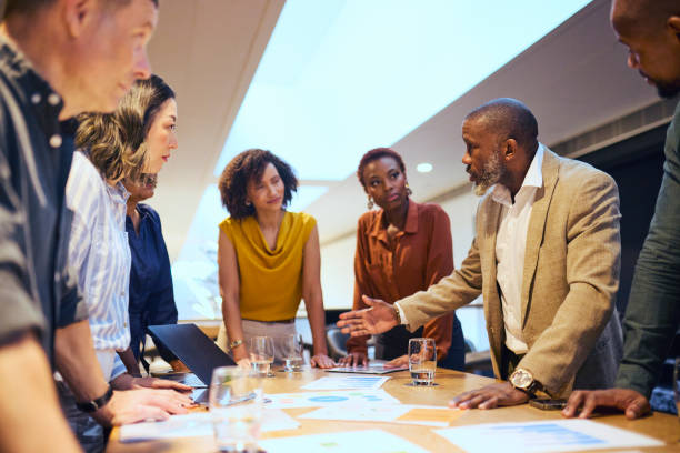istock Engaged Team Discussing Growth Strategies 2193896437
