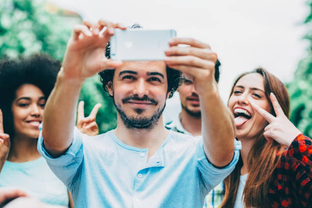 istock Young people taking selfie at the street 2193898238