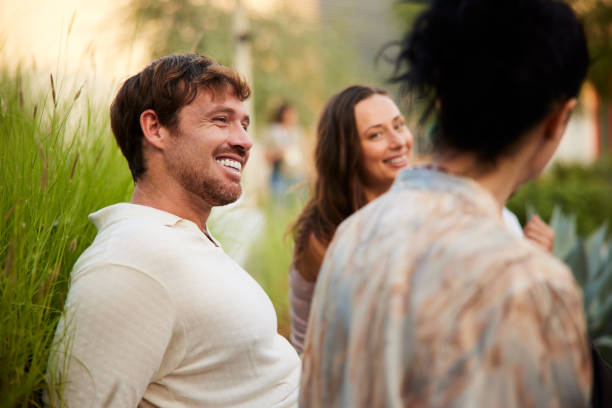 istock Three friends are relaxing, chatting, and enjoying a great time outdoors in Dubai. 2193901461