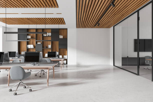 istock Modern open-space office interior with wooden accents and glass partitions. 3D Rendering 2193905460
