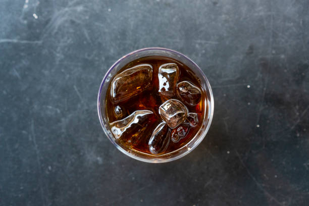 Cold brew coffee and ice cubes in glass