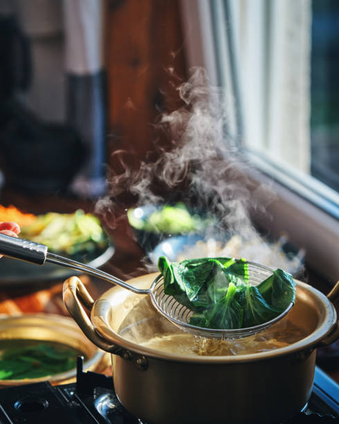 istock Preparing Bibimbap Korean Rice Dish in Domestic Kitchen 2193907459