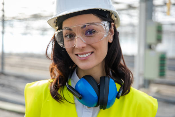 istock Smiling caucasian young female engineer in protective glasses 2193907674