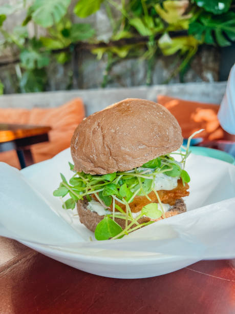 Gourmet Veggie Burger in a Cozy Cafe Setting