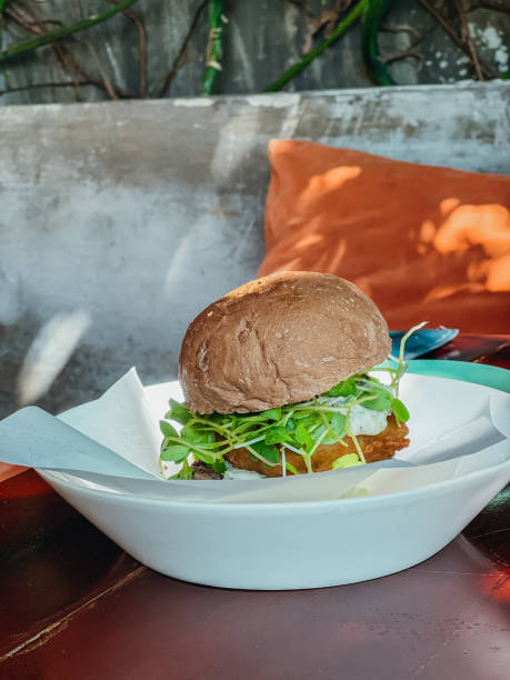 Gourmet Veggie Burger in a Cozy Cafe Setting