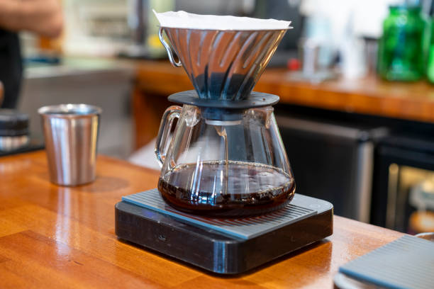 istock V60 brews filter coffee with the brewing method, third generation coffee, Japanese style 2193909118