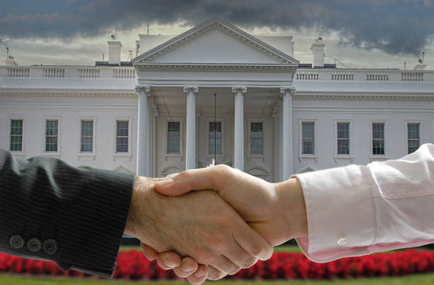 Hands Shaking in Front of the White House