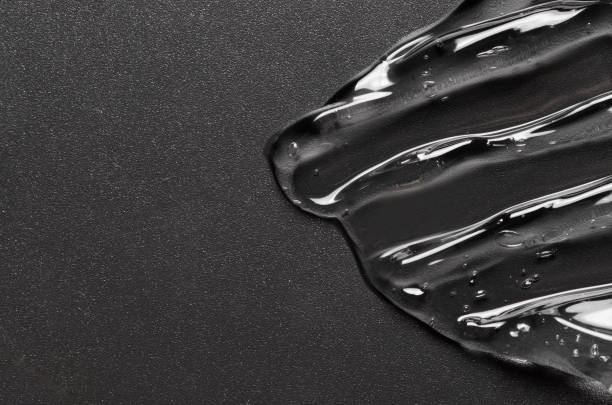 istock Transparent cosmetic moisturizing gel or skin serum on a black background. Copy space 2193911249