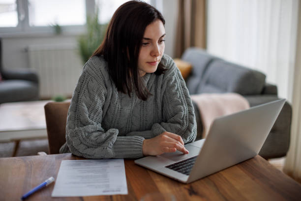 istock Thoughtful woman searching for jobs online 2193912991