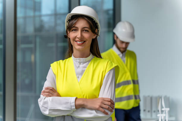 istock Engineers working together in the office on a new construction project 2193913432