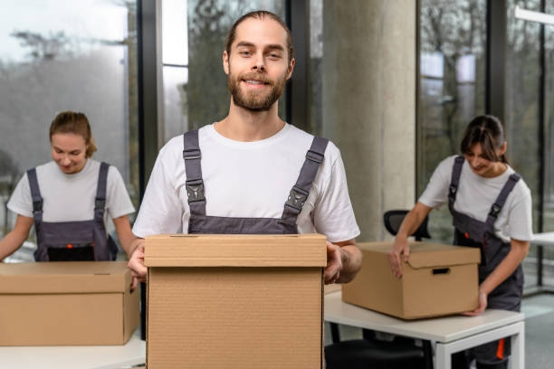 istock Bearded caucasain packaging center worker with a cardboard box in hands 2193913541