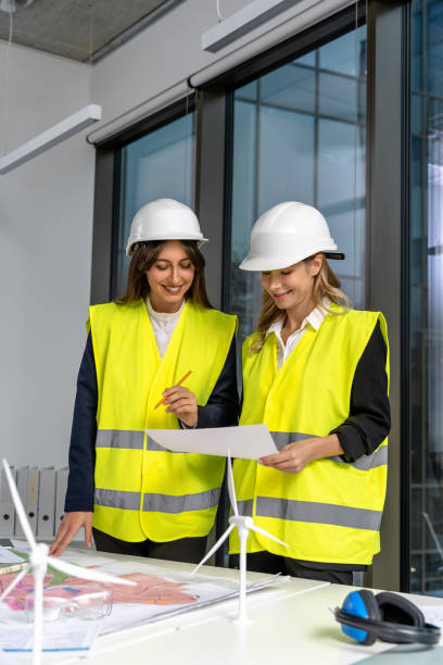 istock Two female engineers looking involved and excited while working together on the project 2193913575