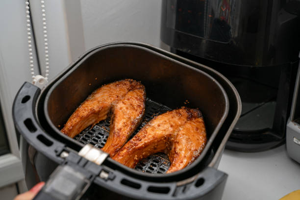 istock salmon slices greased with olive oil for airfrying 2193914503