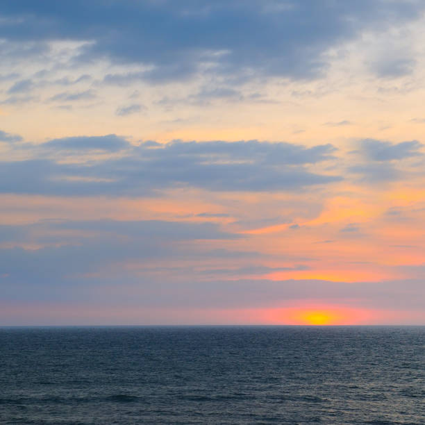 istock Bright red sunset over tropical sea. 2193919645