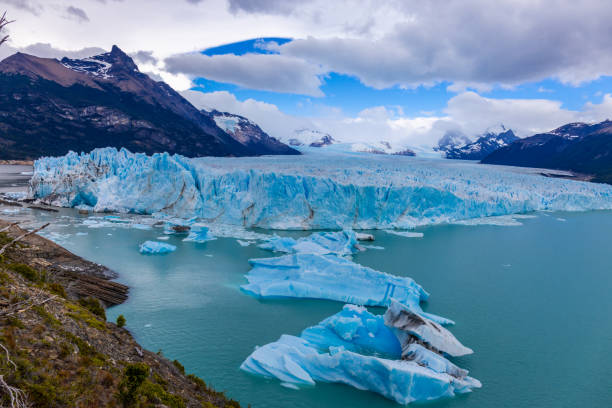 istock Perito Moreno glacier in Patagonia, Argentina. Blue ice glacier with huge seracs falling into the waters of a glacier lake 2193920876
