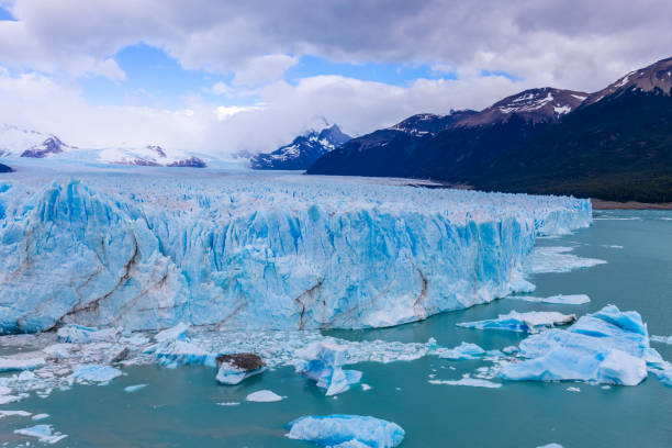 istock Perito Moreno glacier in Patagonia, Argentina. Blue ice glacier with huge seracs falling into the waters of a glacier lake 2193920882