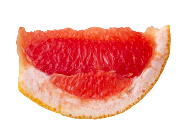 A macro shot of a fresh ripe grapefruit