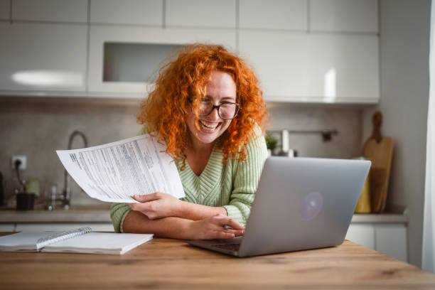istock adult woman work from home on laptop and notebook 2193924746