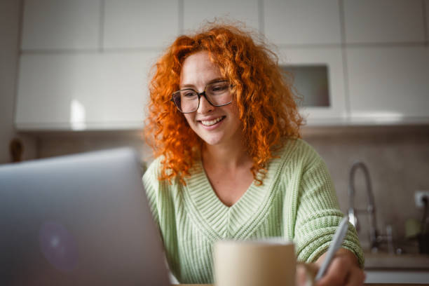 istock adult woman work from home on laptop and notebook 2193925039