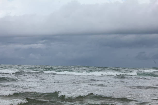 istock beautiful sea view with waves against a white sky background 2193929490