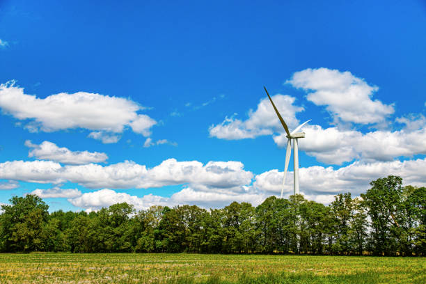 Landscape photo of wind turbines at countryside in autumn or fall