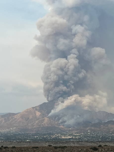 istock mountain and hills on fire with smoke 2193938585