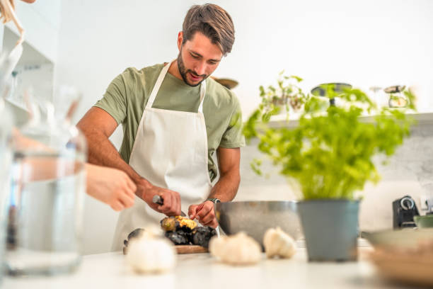 istock Culinary Skills in Action at an Indian Cuisine Workshop 2193939485