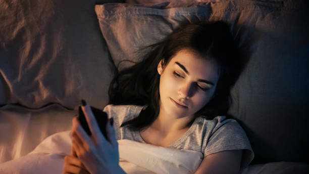 istock Night chat late communication relaxed woman phone 2193940551