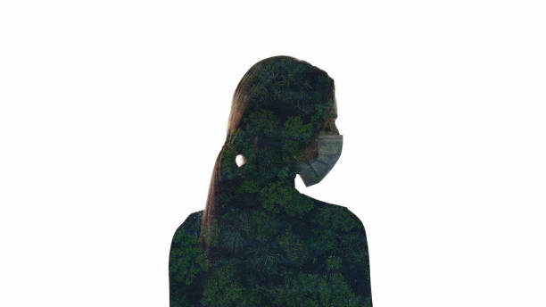 istock Air pollution nature protection forest woman mask 2193940563