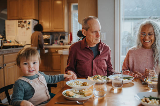 istock Multi-generation family having holiday dinner at home 2193942299