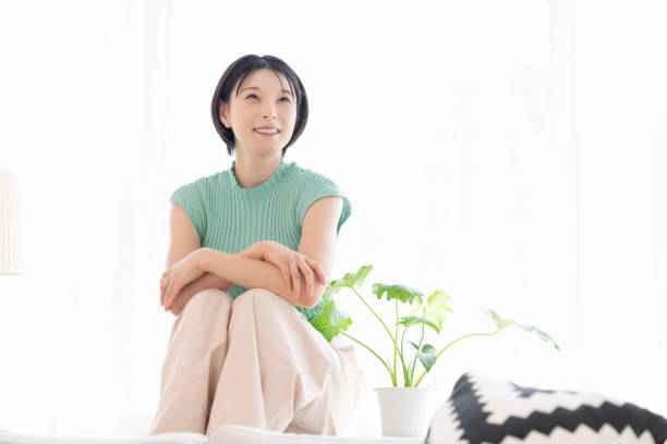 istock attractive asian woman relaxing 2193944606