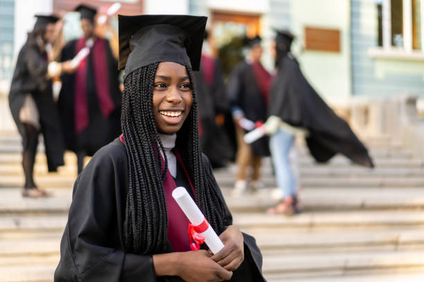 istock Female graduate with diploma 2193947295