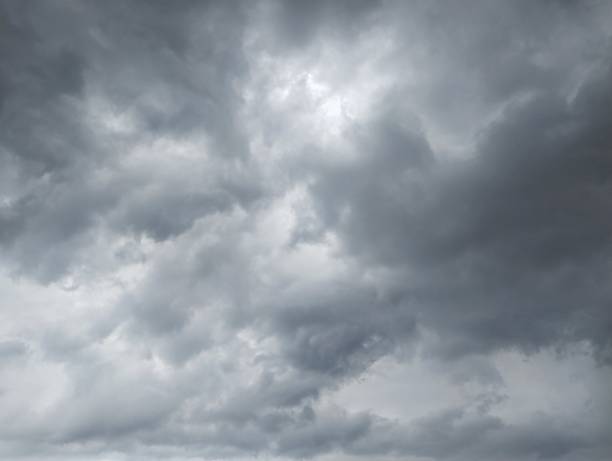 istock Dramatic dark clouds with strong wind in the rainy season 2193947765