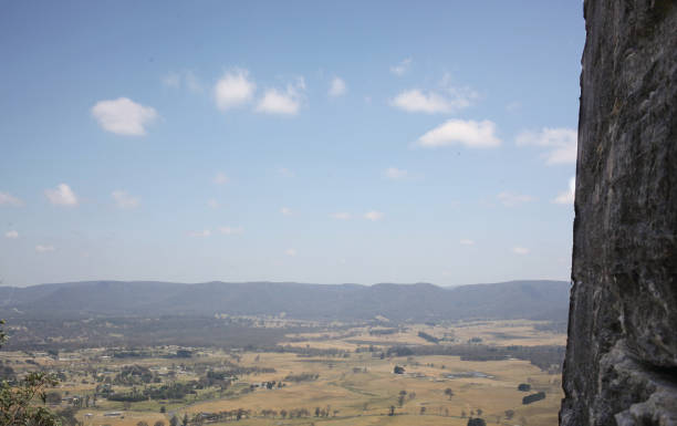 A view from Mount York climbing crag of a valley and mountain range in the distance.