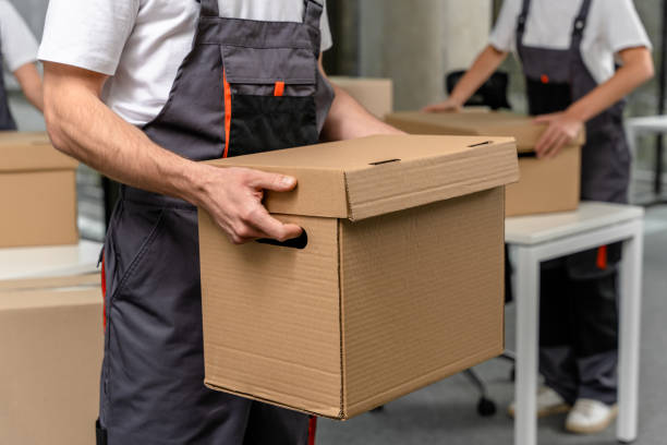 istock Close up of a man holding a big box in hands 2193952609