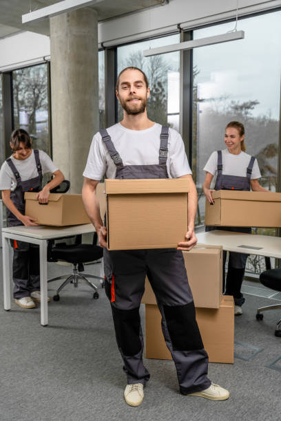 istock Bearded caucasain packaging center worker with a cardboard box in hands 2193952617