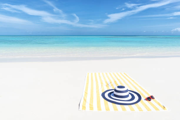 Enjoying summer beach holiday and sunbathing concept