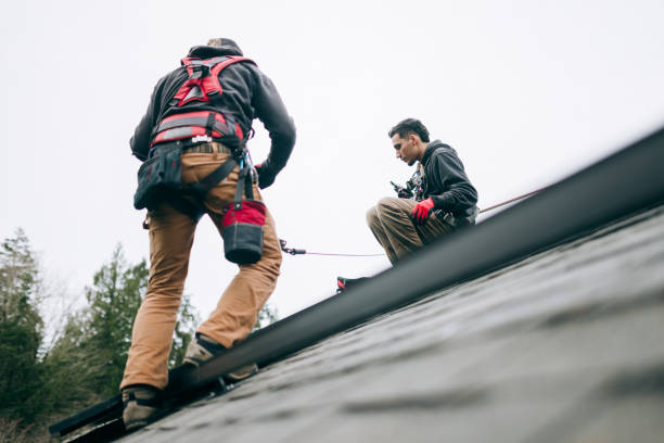 man of roof with hammer