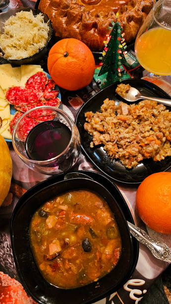 Traditional Russian meat soup Solyanka with sour cream and lemon