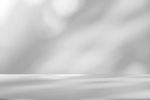 istock Wall interior background, studio and backdrops show products.with shadow from window color white . background for text insertion and presentation product 2193970104