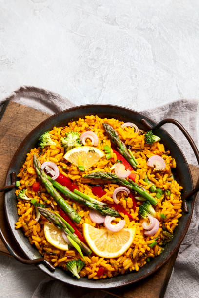 Vegan Paella on gray background.