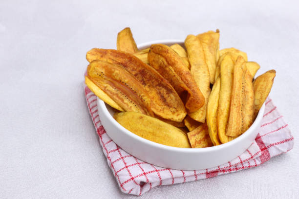 istock Crispy Fried Banana Chips in Bowl 2193972667