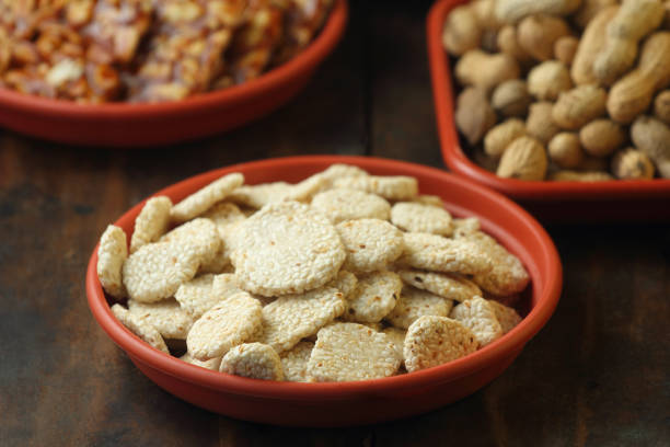 Tilgul, Til Mithai, Gajak, Chikki, Tilkut, Patang, Firki And Peanuts. Harvest Festival Makar Sankranti, Lohri, Uttarayan, Maghi, Poush Sankranthi