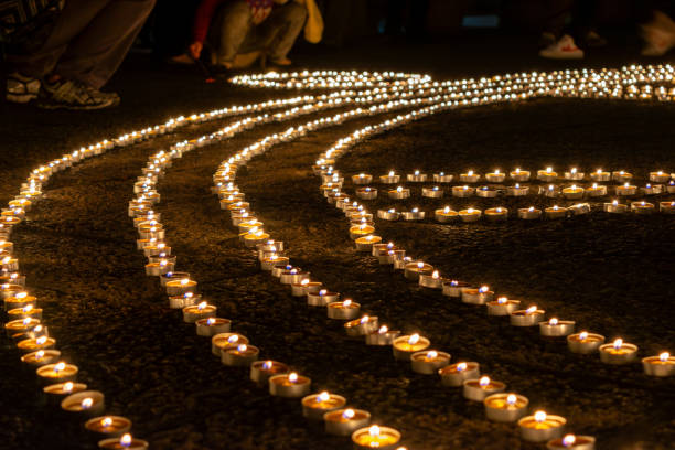 istock Candles lit during Buddhist activities are arranged into Buddhist symbols 2193974679